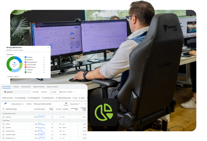 Click Click Media SEO strategist reviewing franchise keyword data and on-page SEO audit results across dual monitors with Semrush dashboards and keyword research tools at the Norwest office.
